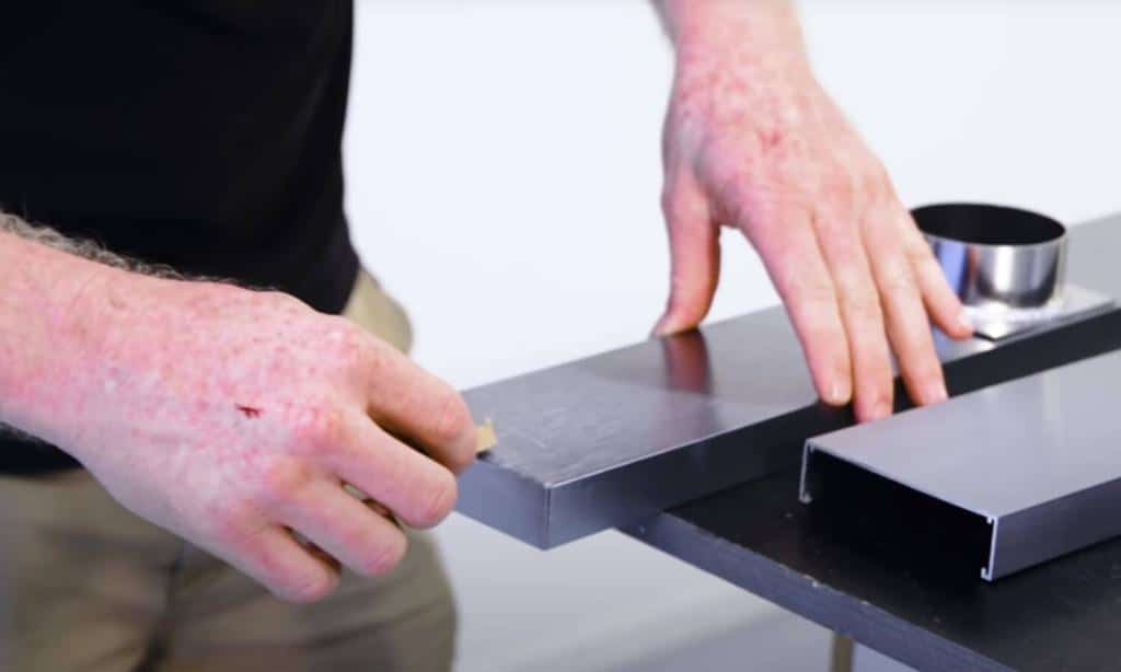 wiping-excess-off-silicon-from-lauxes-grate