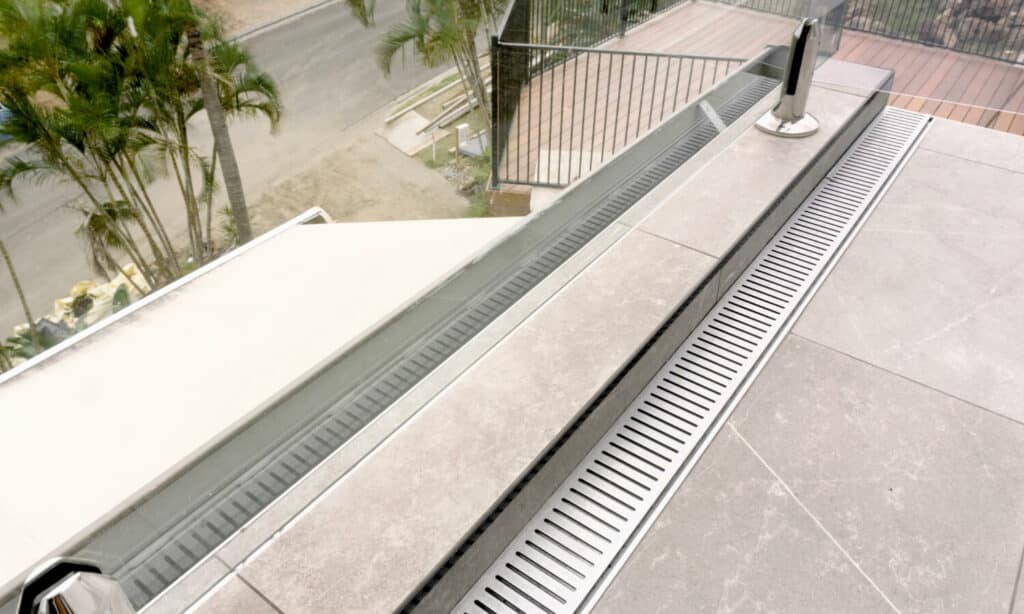 a Balcony showing a Silver Lauxes Drainage System